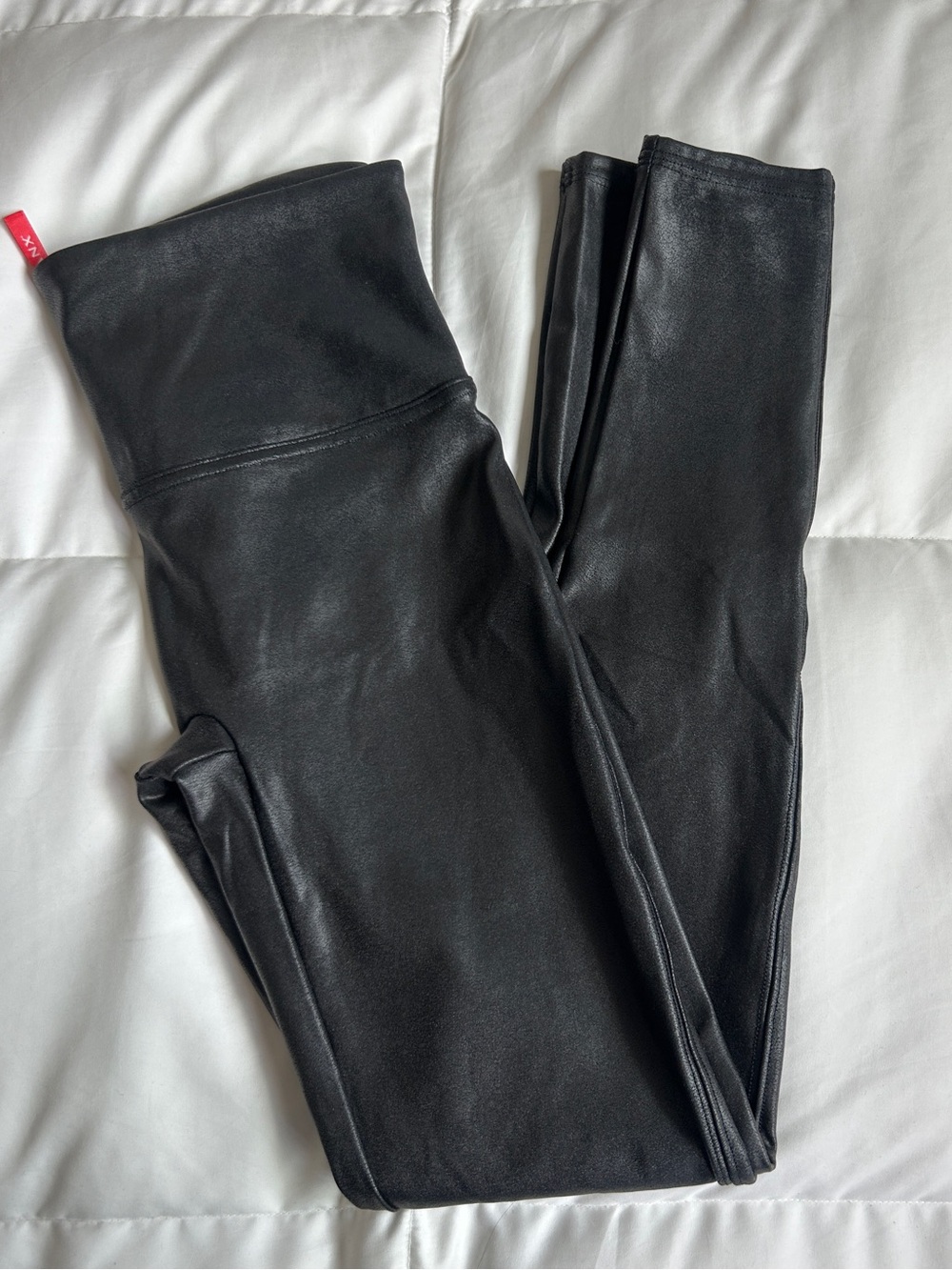 Spanx black faux leather leggings in M